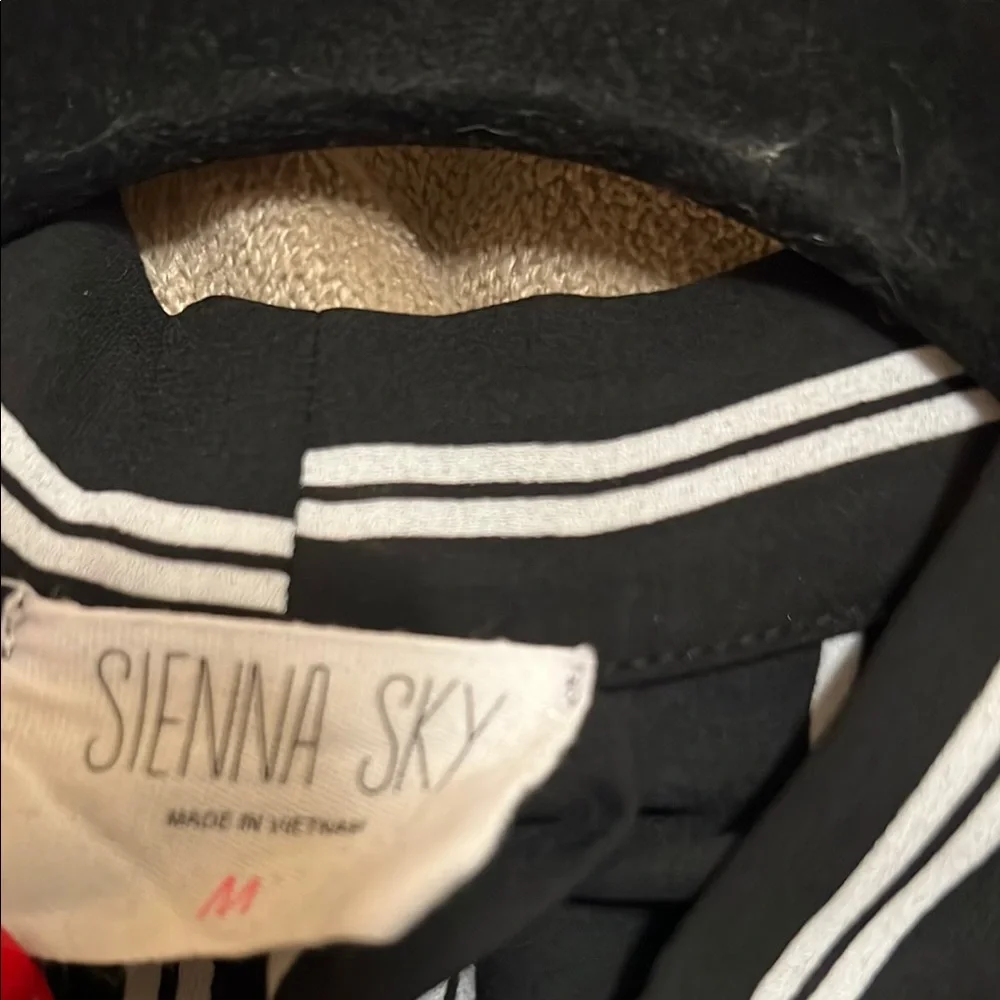 Sienna Sky Black and White Asymmetrical Tie Front Blouse - Picture 2 of 4